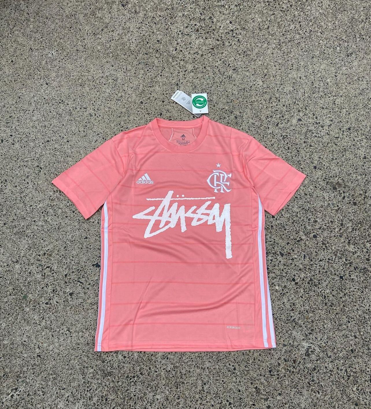 STUSSY×RESONATE グラフィックTシャツ ブラック/ピンク STUSSY×RESONATE グラフィックTシャツ ブラック/ピンク - メルカリ